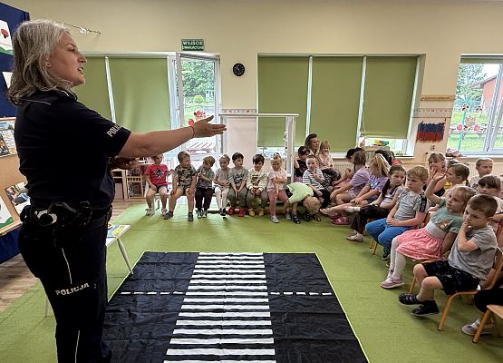 Grafika 14: 09.06.2026 Spotkanie z Panią Policjant "Bezpieczne wakacje"
